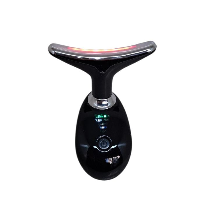 Masajeador facial EMS Brisea en color negro con luz LED encendida